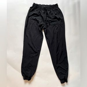 TNA drawstring track pants (black, size large)